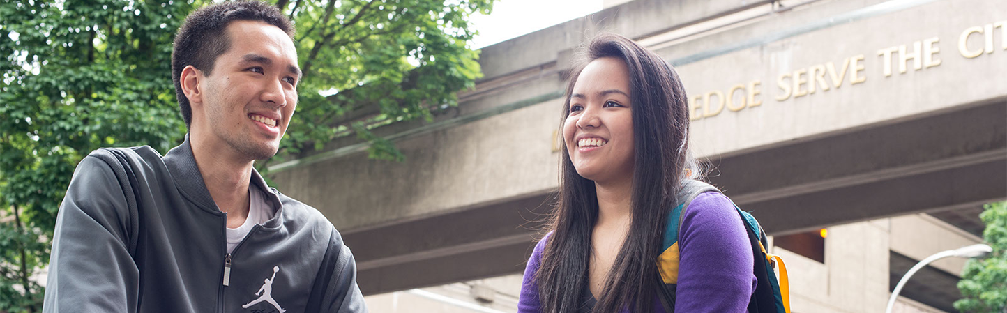 Students conversing on campus.