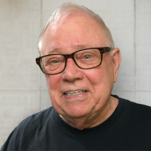 Bob Hormel smiling in glasses